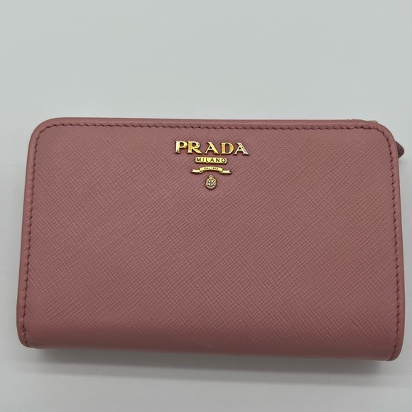 Prada Handbags - ❌SOLD❌Authentic Prada pink Saffiano leather compact wallet